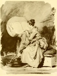Fille lisant assise sur une table pliante
